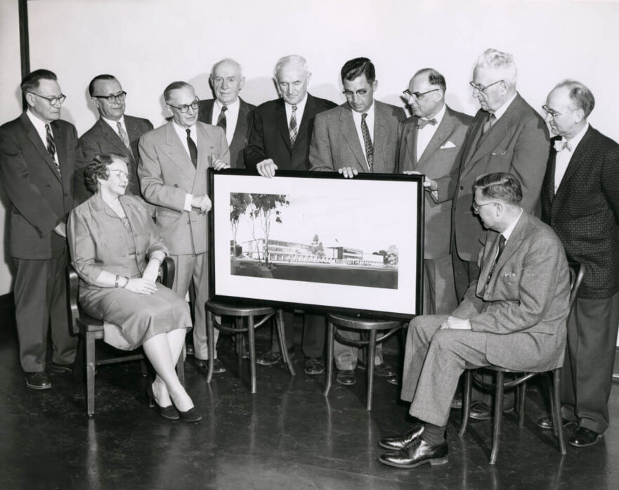 Board members view artist’s rendition of Donald E. Gavit Junior Senior High School