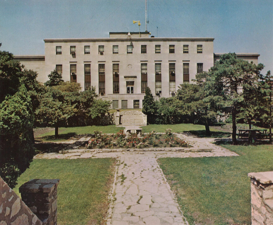 East façade of City Hall, with Sunken Rose Garden in the foreground, circa 1971.