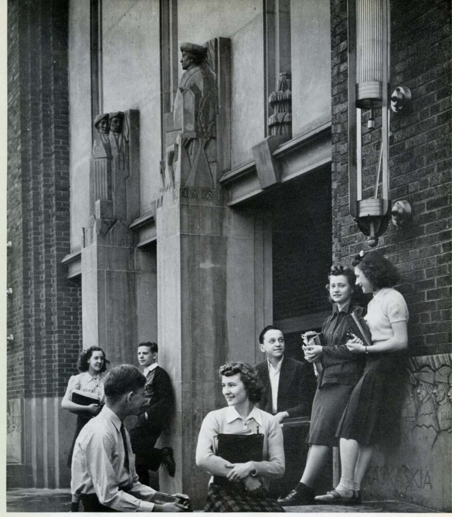 North entrance, 119th Street, note the carved figures over the entrance