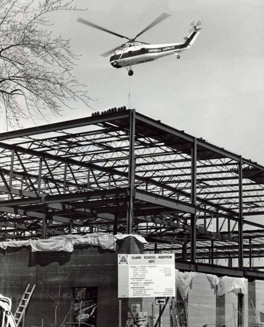 Helicopter delivering HVAC to the 1971 addition