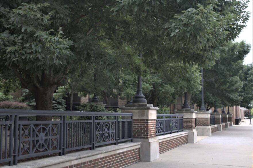 Ornamental fencing and lighting added to form a courtyard in front of George Rodgers Clark High School