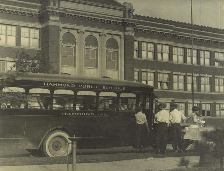 Hammond High School with school bus, circa 1922