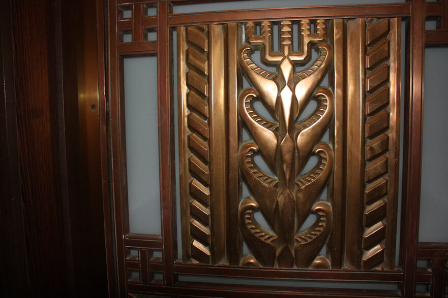 A top panel on one of the original Iannelli bronze door that once hung on the main entrance to Hammond City Hall, now on permanent loan to Purdue University Northwest.