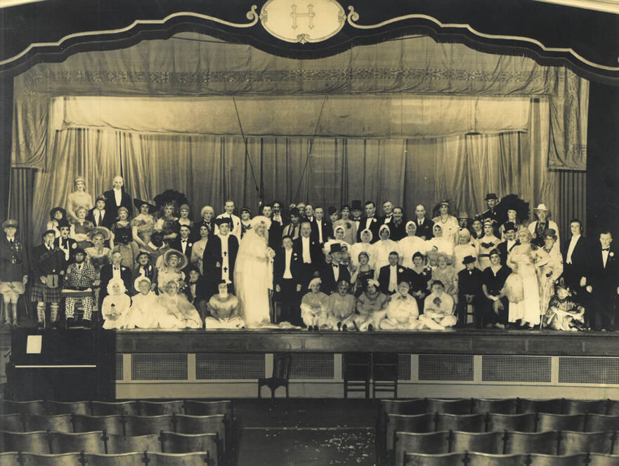 Students in costume in auditorium, 1923