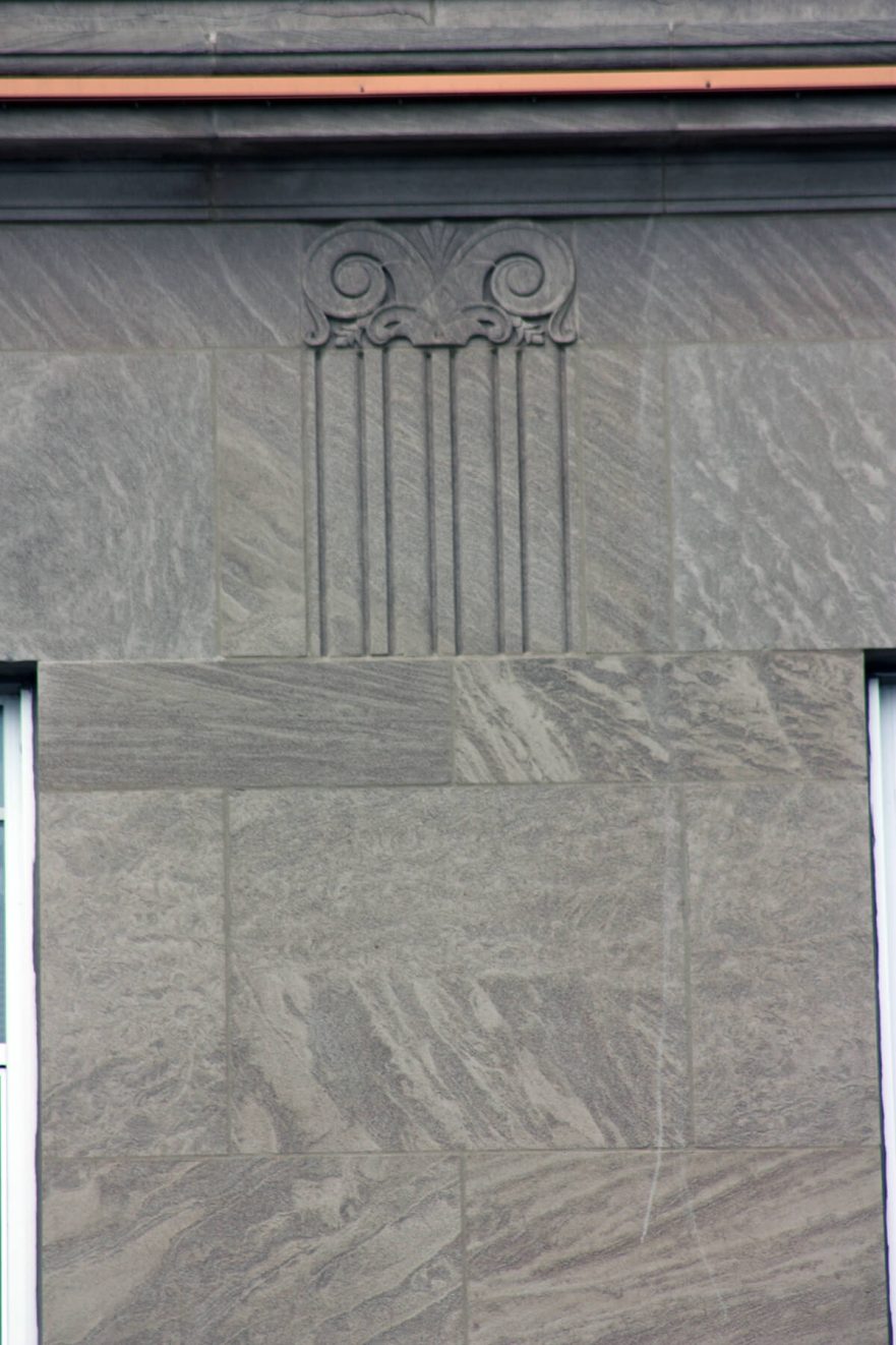 Carved columns on east façade of City Hall, circa 2022.